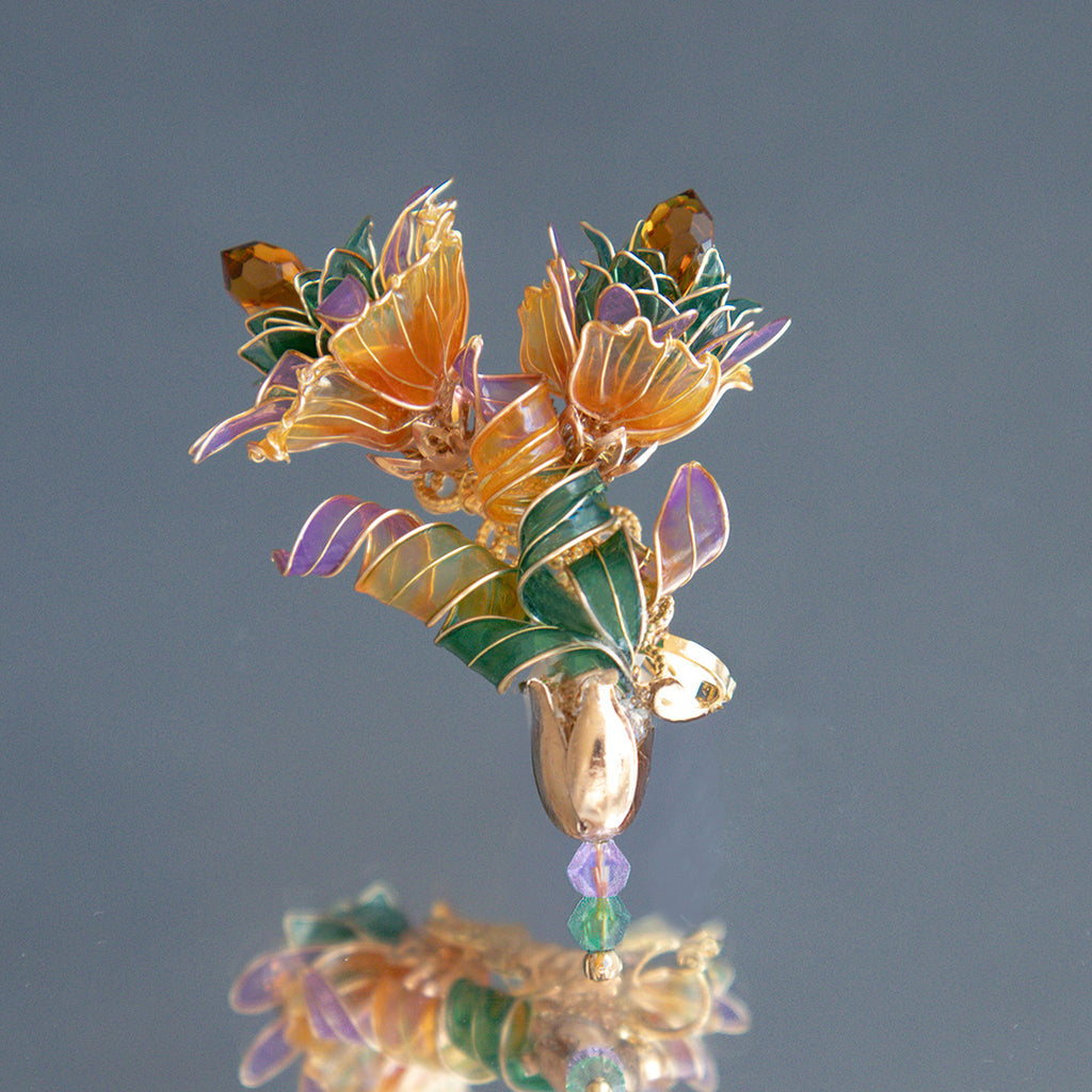 螺旋の花冠イヤークリップ（数量限定）オレンジ