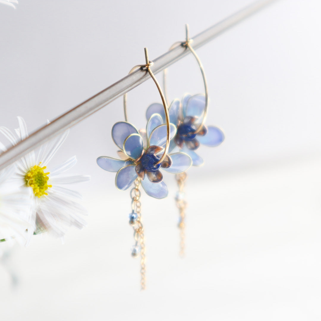 Flower earrings waiting for spring blue